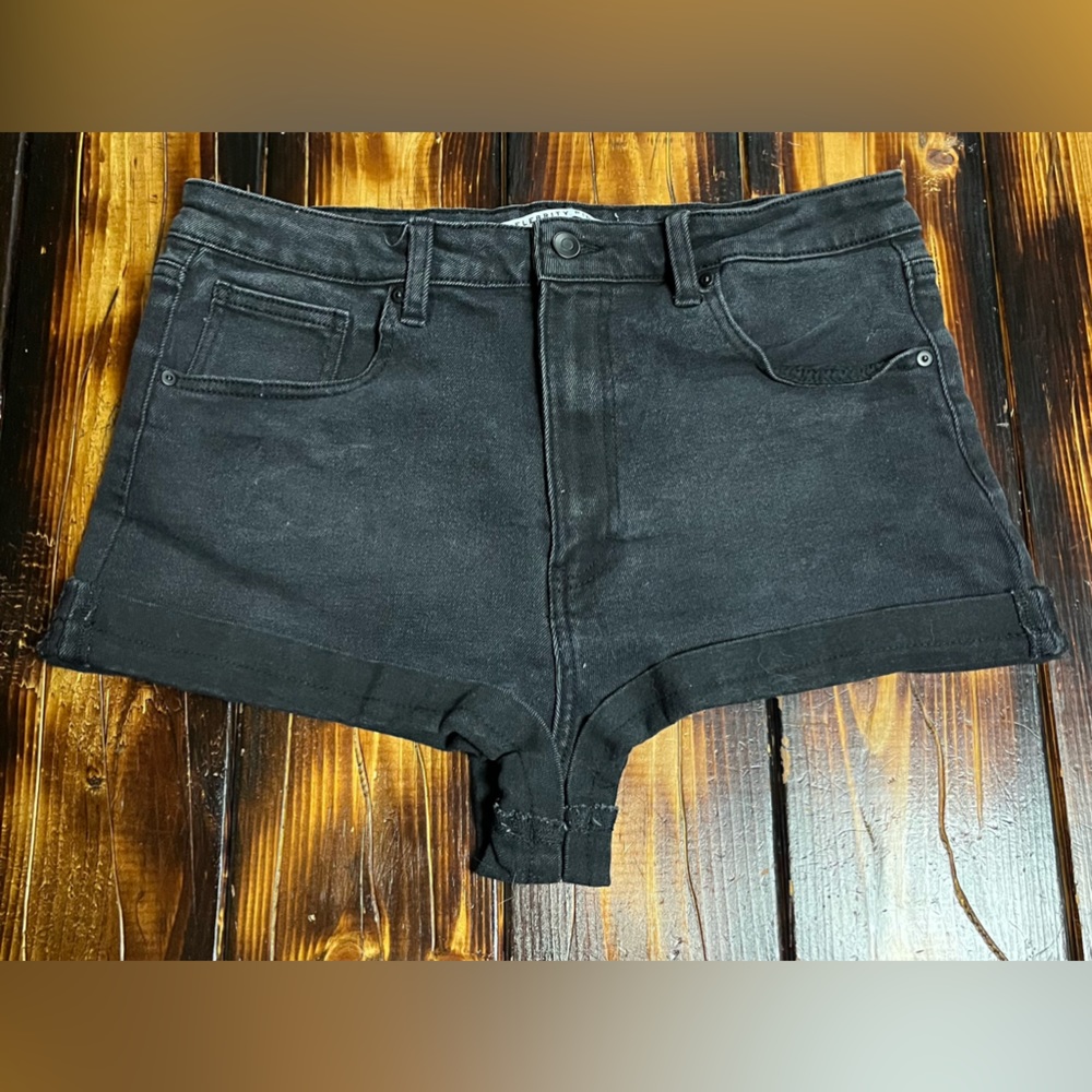 Black jean shorts.